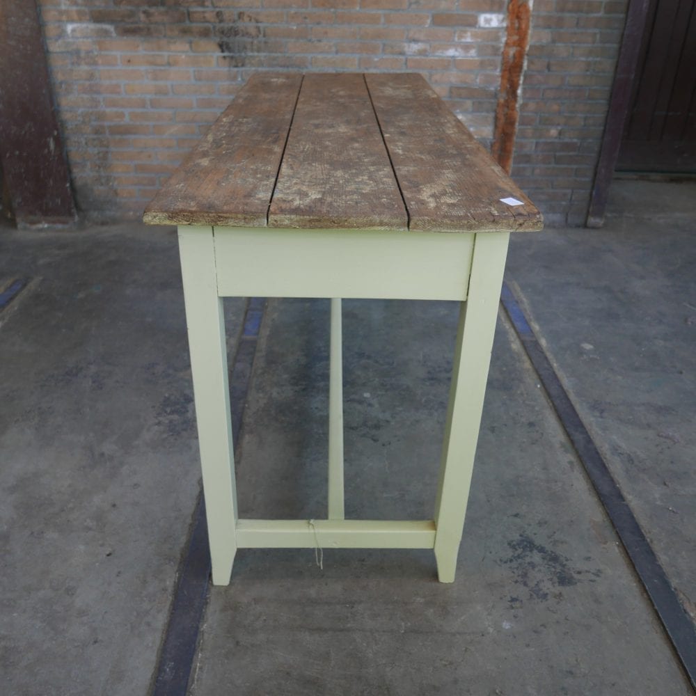 Gele eettafel met zes lades